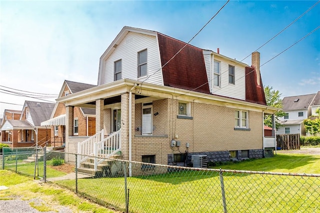315 Wright St, Mckees Rocks, PA 15136 - colonial inspired home featuring brick siding, a gambrel roof, central AC, a chimney, and a shingled roof