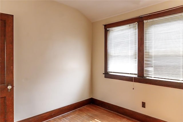 315 Wright St, Mckees Rocks, PA 15136 - empty room with baseboards, light wood-type flooring, and lofted ceiling