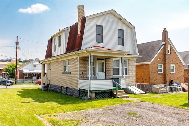 315 Wright St, Mckees Rocks, PA 15136 - colonial inspired home with brick siding, a chimney, and a gambrel roof