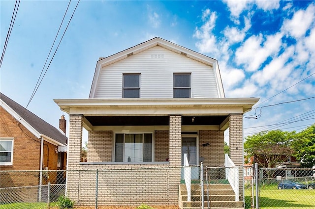 315 Wright St, Mckees Rocks, PA 15136 - dutch colonial featuring a porch, a gambrel roof, and brick siding