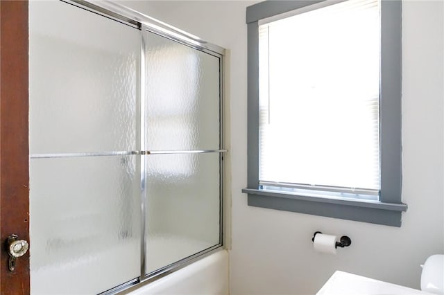 315 Wright St, Mckees Rocks, PA 15136 - bathroom with toilet, healthy amount of natural light, and enclosed tub / shower combo