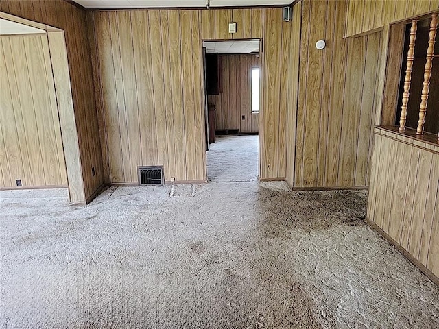 214 Washington Ave, Mount Pleasant Twp Was, PA 15340 - spare room with carpet floors, wooden walls, and baseboards