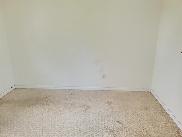 214 Washington Ave, Mount Pleasant Twp Was, PA 15340 - spare room with baseboards and light carpet