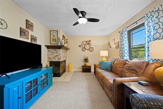 208 Ruffed Grouse Dr, North Fayette, PA 15126 - living room with light carpet, a textured ceiling, a ceiling fan, a stone fireplace, and baseboards