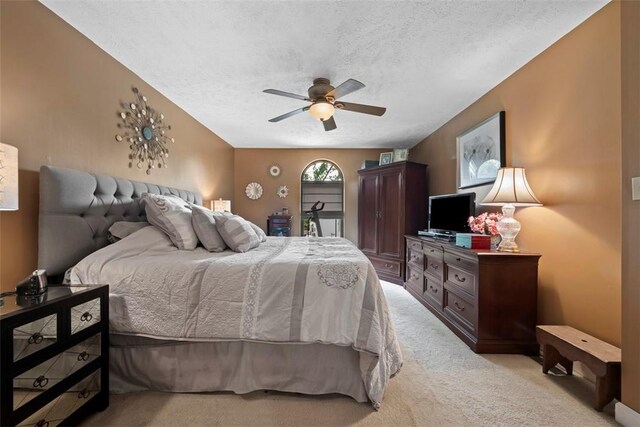 208 Ruffed Grouse Dr, North Fayette, PA 15126 - bedroom featuring light colored carpet, a textured ceiling, and a ceiling fan