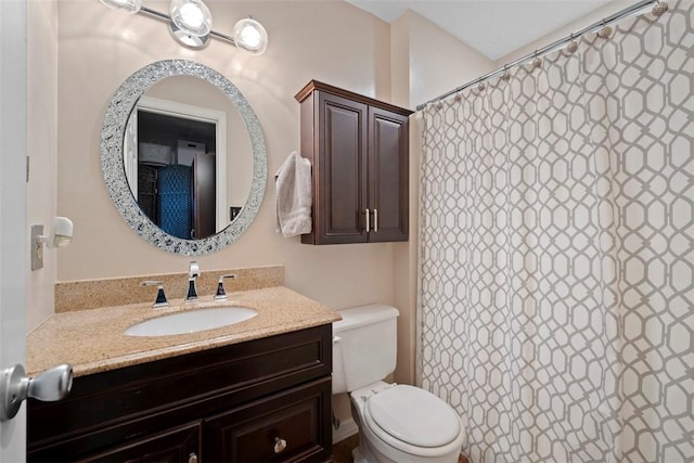 208 Ruffed Grouse Dr, North Fayette, PA 15126 - bathroom featuring vanity, toilet, and a shower with shower curtain