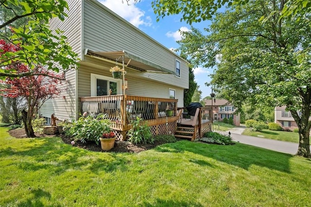 208 Ruffed Grouse Dr, North Fayette, PA 15126 - back of house featuring a lawn and a wooden deck