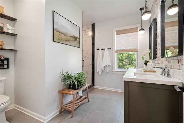 323 44th St, Lawrenceville, PA 15201 - bathroom featuring toilet, vanity, a shower stall, and baseboards