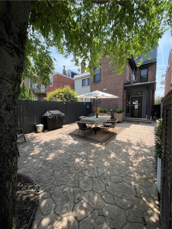 323 44th St, Lawrenceville, PA 15201 - view of patio / terrace featuring outdoor dining space
