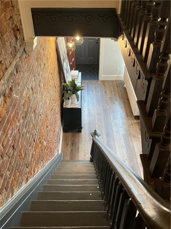 323 44th St, Lawrenceville, PA 15201 - staircase with hardwood / wood-style flooring