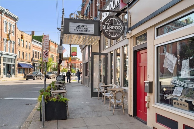 323 44th St, Lawrenceville, PA 15201 - view of asphalt street with sidewalks, curbs, traffic signs, and street lighting