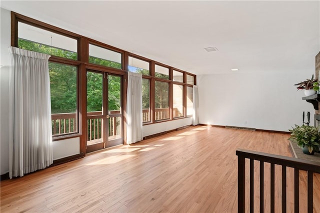 102 Colwyn Rd, Ross Twp, PA 15237 - unfurnished living room with wood finished floors and baseboards