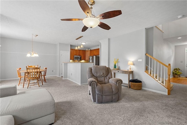 254 Maple Ridge Dr, Cecil, PA 15317 - living area featuring stairs, ceiling fan, light carpet, and baseboards
