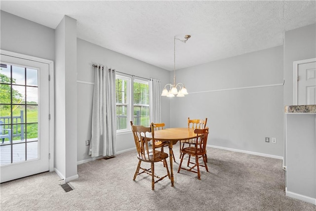 254 Maple Ridge Dr, Cecil, PA 15317 - dining room featuring a chandelier, carpet, a textured ceiling, and baseboards