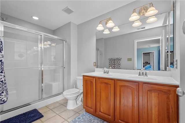 254 Maple Ridge Dr, Cecil, PA 15317 - bathroom featuring tile patterned floors, a shower stall, double vanity, and toilet