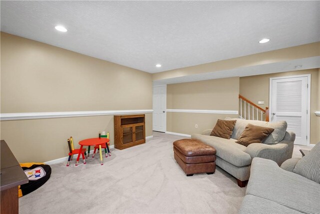 254 Maple Ridge Dr, Cecil, PA 15317 - carpeted living area featuring baseboards, recessed lighting, and stairs