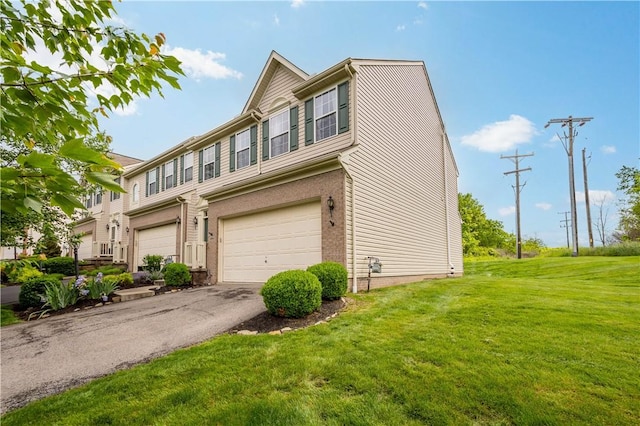 254 Maple Ridge Dr, Cecil, PA 15317 - view of front of house featuring an attached garage, driveway, and a front yard