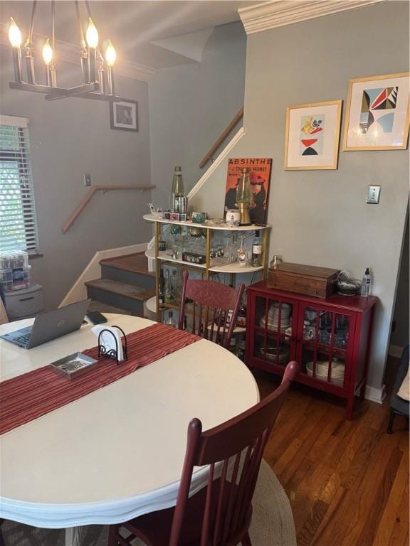 623 5th St, Oakmont, PA 15139 - dining area featuring stairs, a chandelier, wood finished floors, and ornamental molding