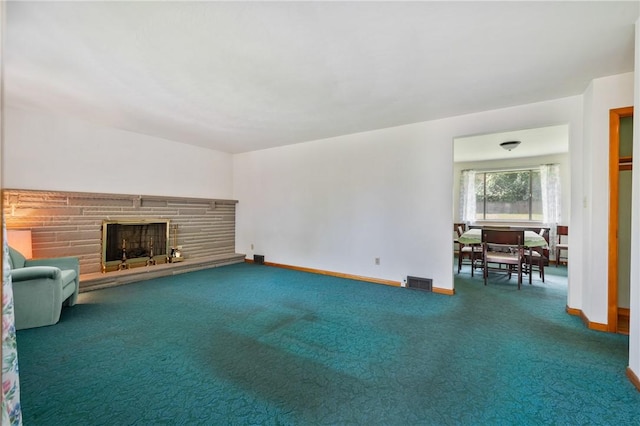 109 Mattier Dr, Ohara, PA 15238 - unfurnished living room featuring carpet floors, baseboards, and a fireplace