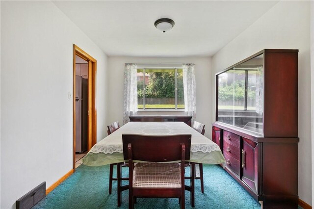 109 Mattier Dr, Ohara, PA 15238 - carpeted dining area with baseboards