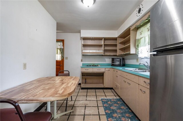 109 Mattier Dr, Ohara, PA 15238 - kitchen with freestanding refrigerator, a sink, open shelves, light tile patterned flooring, and light brown cabinets