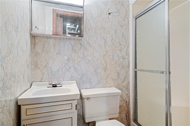 109 Mattier Dr, Ohara, PA 15238 - bathroom featuring toilet, a shower stall, vanity, and tile walls