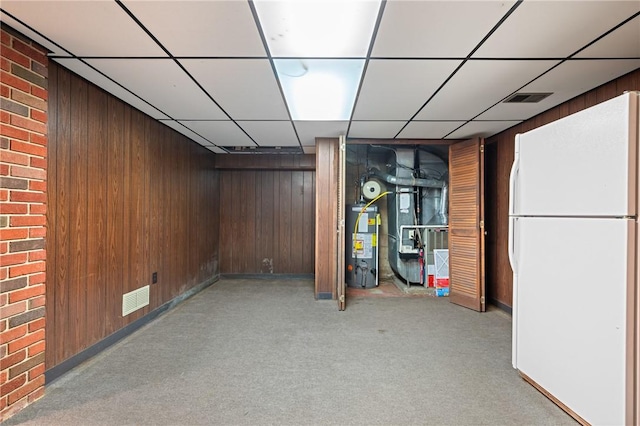 109 Mattier Dr, Ohara, PA 15238 - finished basement with freestanding refrigerator, water heater, light carpet, wood walls, and a drop ceiling