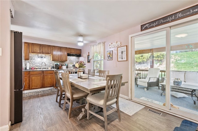 1006 Willow Glen Dr, Bethel Park, PA 15102 - dining space featuring wood finished floors, a ceiling fan, and baseboards