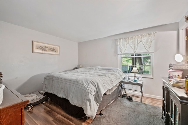 1006 Willow Glen Dr, Bethel Park, PA 15102 - bedroom with wood finished floors and baseboards