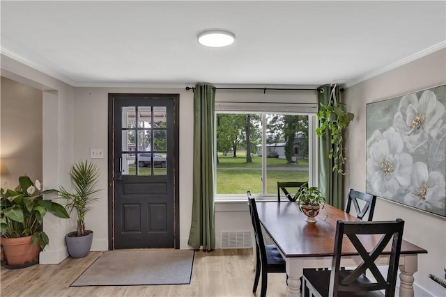 169 Plum Way, Wayne Twp Law, PA 16157 - dining room featuring plenty of natural light, wood finished floors, crown molding, and baseboards