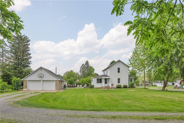 169 Plum Way, Wayne Twp Law, PA 16157 - view of front of house with dirt driveway, a front lawn, and a garage
