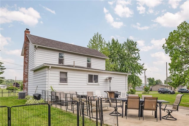 169 Plum Way, Wayne Twp Law, PA 16157 - back of house featuring a chimney, central AC unit, a patio, and outdoor dining space