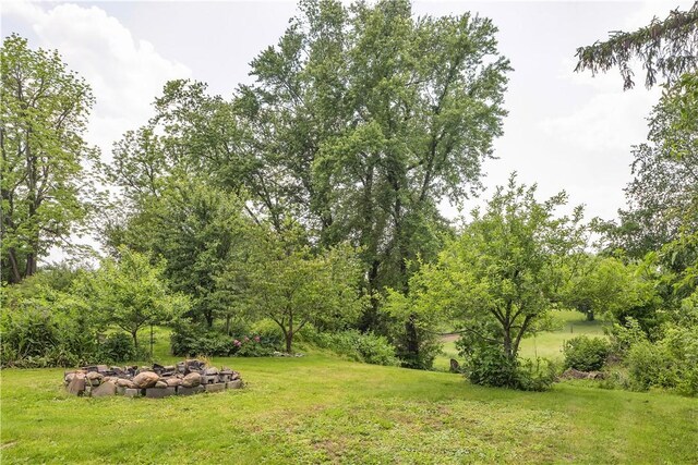 169 Plum Way, Wayne Twp Law, PA 16157 - view of grassy yard featuring a fire pit