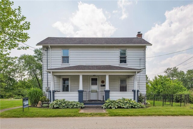 169 Plum Way, Wayne Twp Law, PA 16157 - traditional style home with covered porch and a chimney