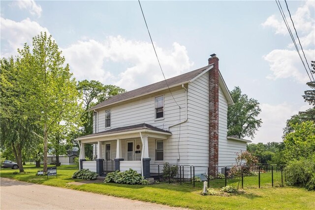 169 Plum Way, Wayne Twp Law, PA 16157 - view of front of home featuring a porch and a chimney