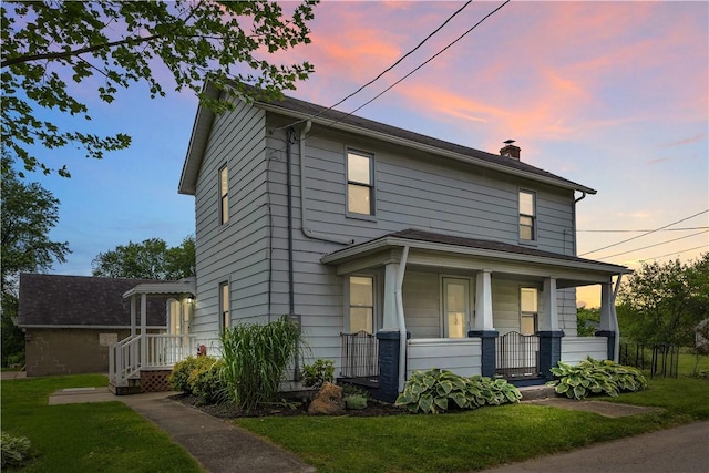 169 Plum Way, Wayne Twp Law, PA 16157 - traditional style home featuring covered porch, a chimney, and a yard