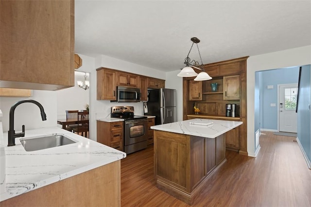113 Silo Ct, North Fayette, PA 15071 - kitchen with stainless steel appliances, a sink, dark wood-style floors, open shelves, and light stone countertops