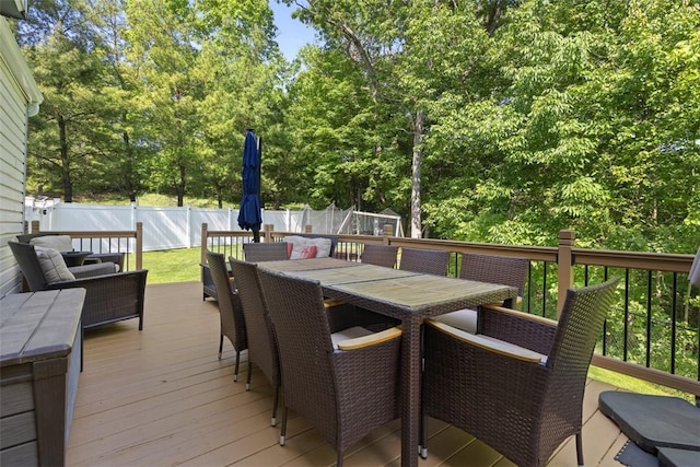 113 Silo Ct, North Fayette, PA 15071 - wooden terrace with outdoor dining area and a fenced backyard
