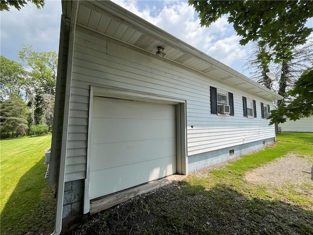 807 Sutton St, Punxsutawney Area School District, PA 15767 - view of side of home featuring a garage, a yard, cooling unit, and crawl space