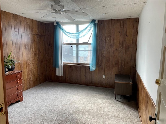3884 E St, Perry Hilltop, PA 15214 - unfurnished room with wood walls, light colored carpet, and a ceiling fan