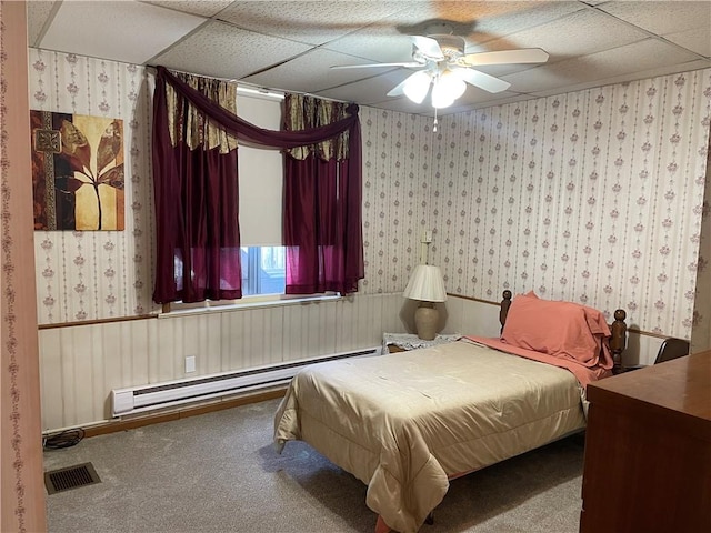 3884 E St, Perry Hilltop, PA 15214 - carpeted bedroom with a baseboard radiator, wallpapered walls, a drop ceiling, and ceiling fan