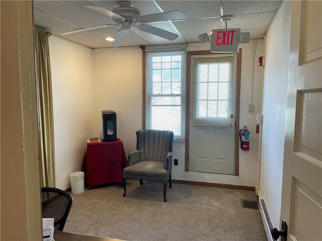 3884 E St, Perry Hilltop, PA 15214 - sitting room featuring carpet floors, a drop ceiling, a ceiling fan, and baseboards