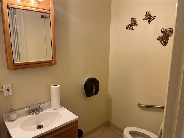 3884 E St, Perry Hilltop, PA 15214 - half bathroom with toilet, vanity, tile patterned floors, and baseboards