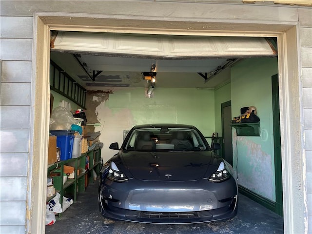 3884 E St, Perry Hilltop, PA 15214 - garage featuring a garage door opener