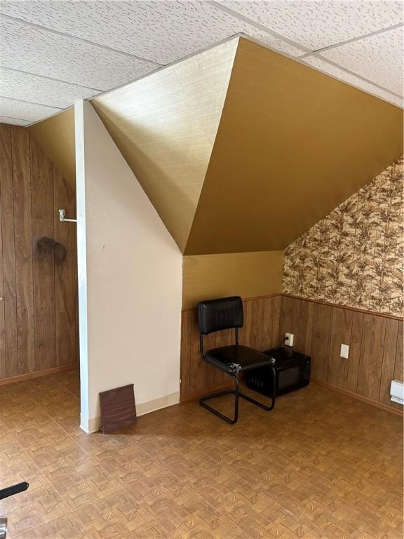 3884 E St, Perry Hilltop, PA 15214 - bonus room featuring a wainscoted wall, baseboards, wooden walls, and vaulted ceiling