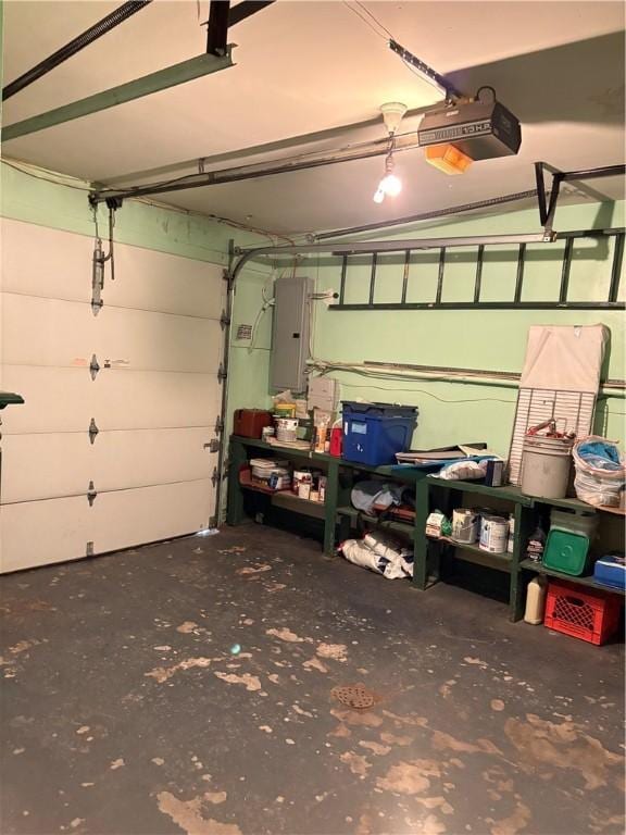 3884 E St, Perry Hilltop, PA 15214 - garage featuring electric panel and a garage door opener