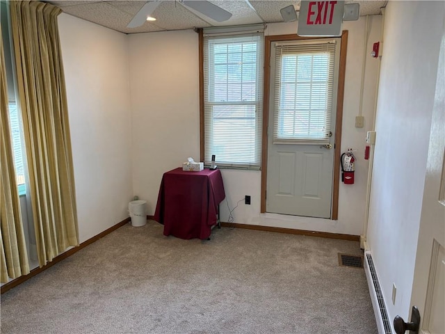 3884 E St, Perry Hilltop, PA 15214 - entryway with baseboard heating, carpet, and baseboards