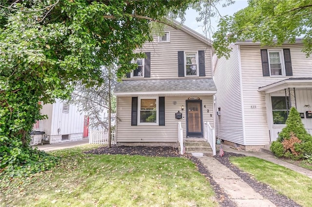 429 Market St, Beaver, PA 15009 - view of front of home featuring a front lawn and a shingled roof