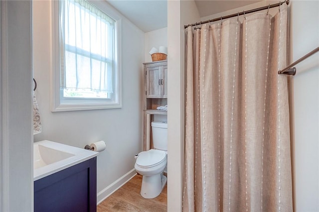 429 Market St, Beaver, PA 15009 - bathroom with toilet, wood finished floors, vanity, baseboards, and a shower with shower curtain