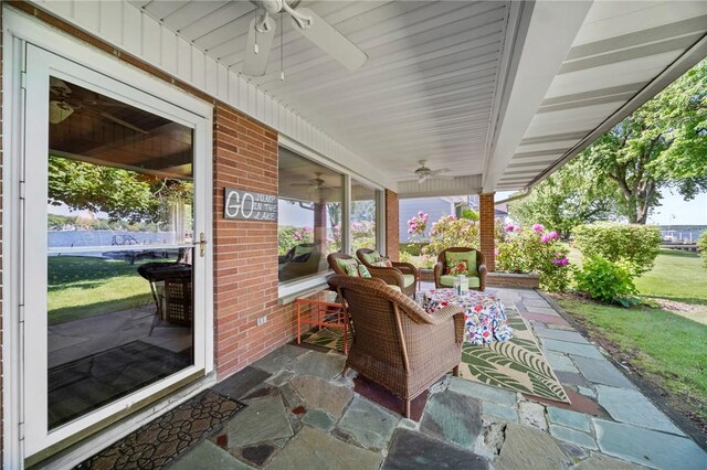 10756 Aldina Dr, Conneaut Lake, PA 16316 - porch featuring a ceiling fan